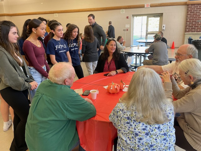 image of students and seniors at the Senior Breakfast.