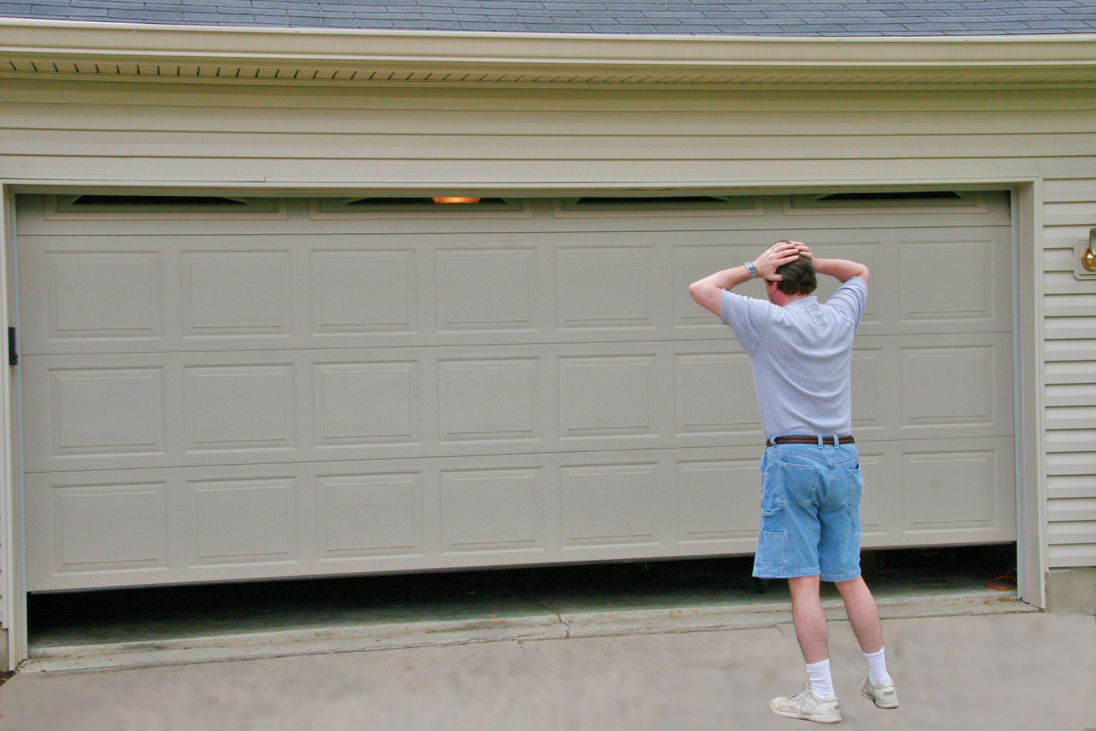 how to fix a broken garage door