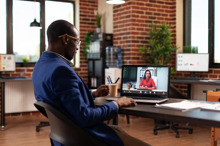 Man using video interview software