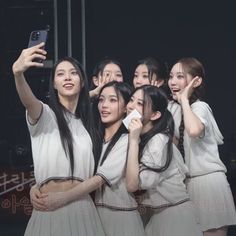 This contains an image of I’LL-IT group of Girls putting on white dress