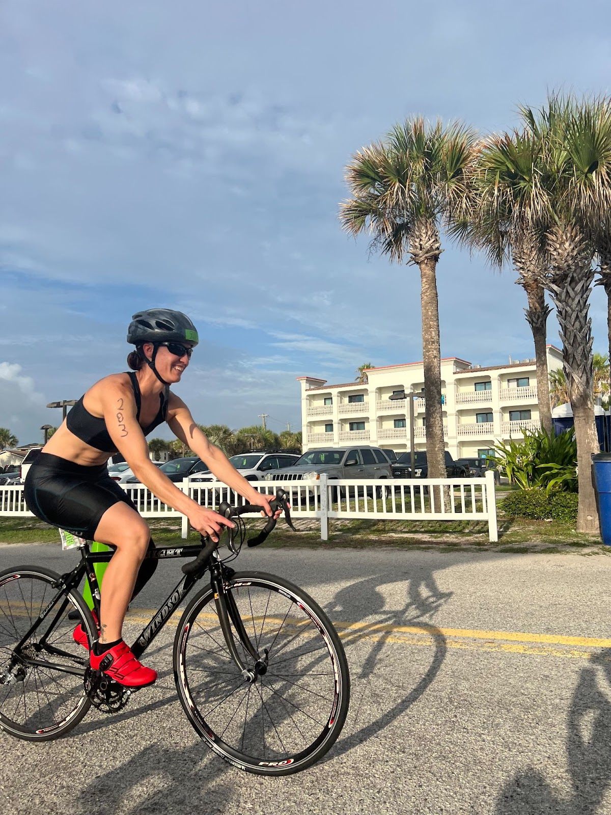 cortney welch biking in a triathlon