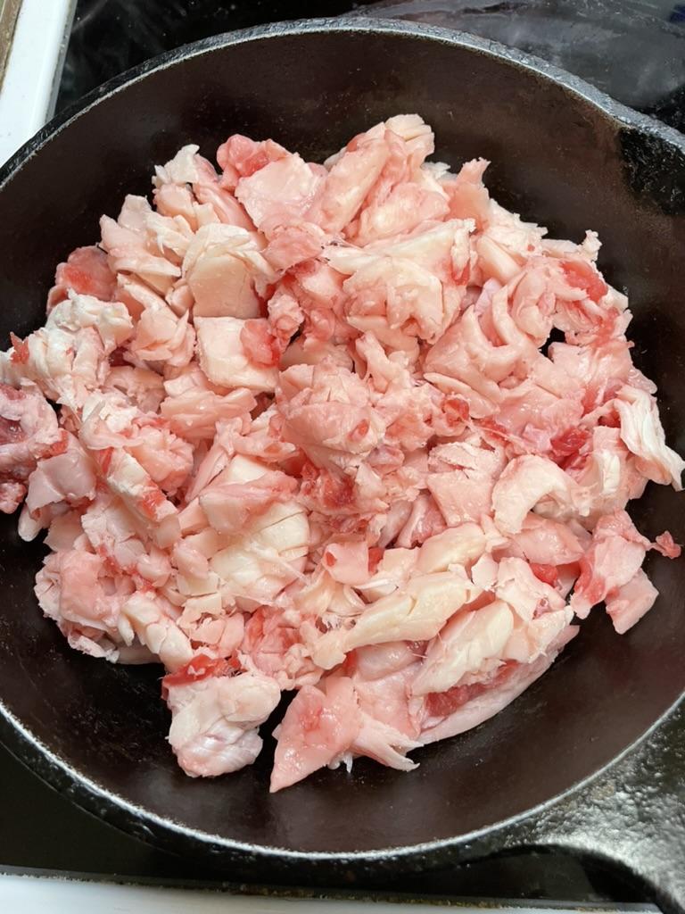 A bowl of crab meat

AI-generated content may be incorrect.