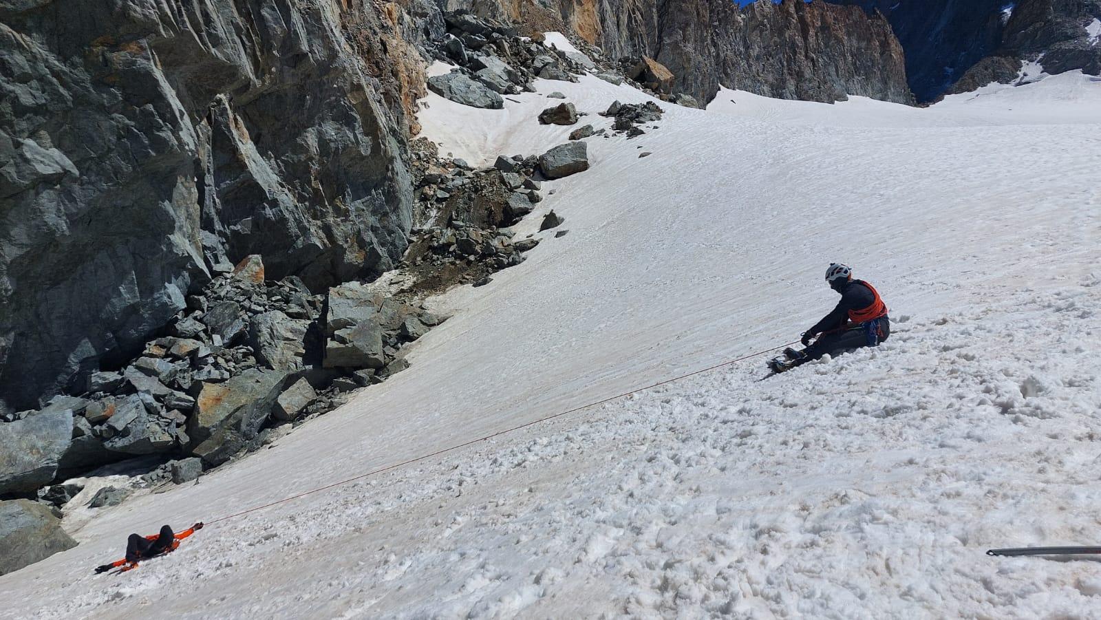 A person sitting on a snow covered slopeAI-generated content may be incorrect.