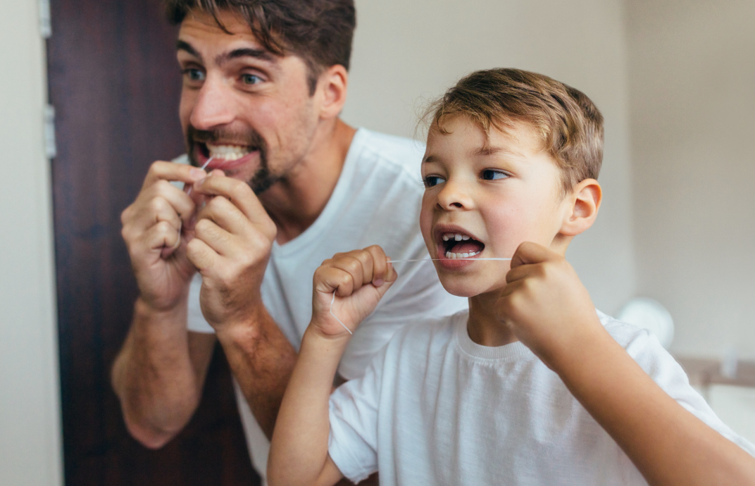 Family flossing together 