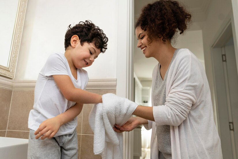 child and mum in a bathroom