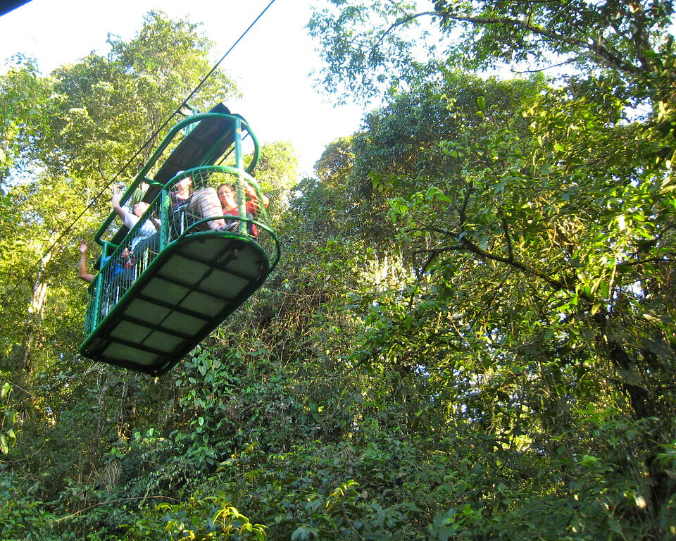 A tram with people in it.