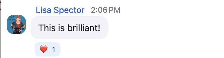 A screenshot of a chat message from Lisa Spector, timestamped at 2:06 PM. The message reads: “This is brilliant!” in a rounded light gray speech bubble. Below the message is a red heart emoji reaction with the number 1 next to it, indicating one person reacted. Lisa’s profile picture shows her holding a dog, set against a teal background.