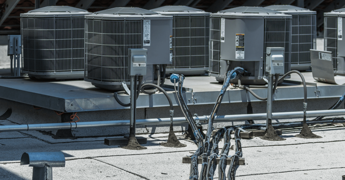 Air conditioning units on the roof of a climate-controlled storage facility.