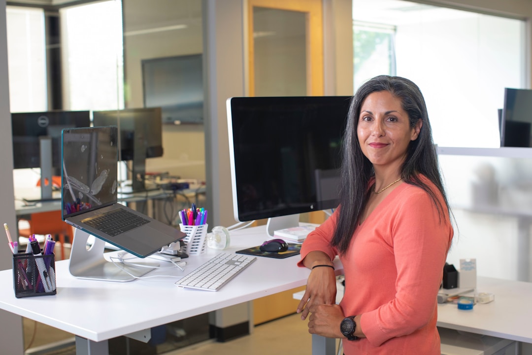 A female professional utilizing an enterprise AI tool to enhance data-driven decision-making in a business environment
