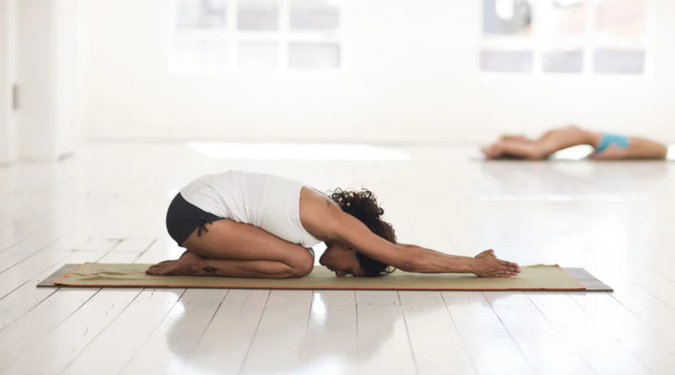 Promotes Relaxation through Asanas (Yoga Poses)