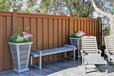 comparing michigan deck privacy solutions composite fencing with bench seating and planters custom built okemos