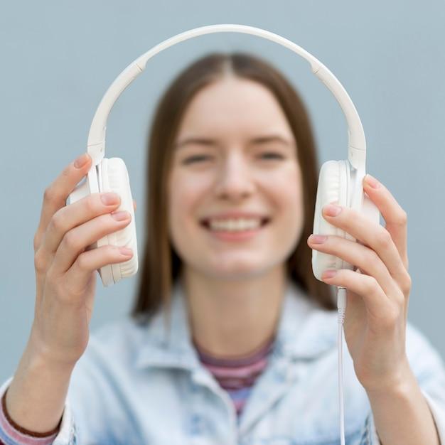 Happy woman listening to music