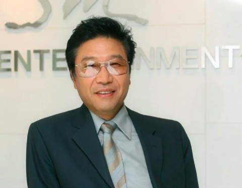 This contains an image of Lee Soo Man