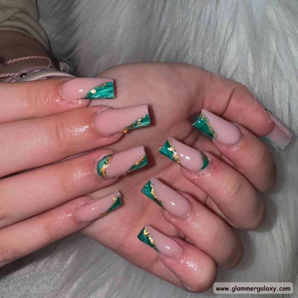 Winter and Fall Dark Green Nails having Unique Twists
