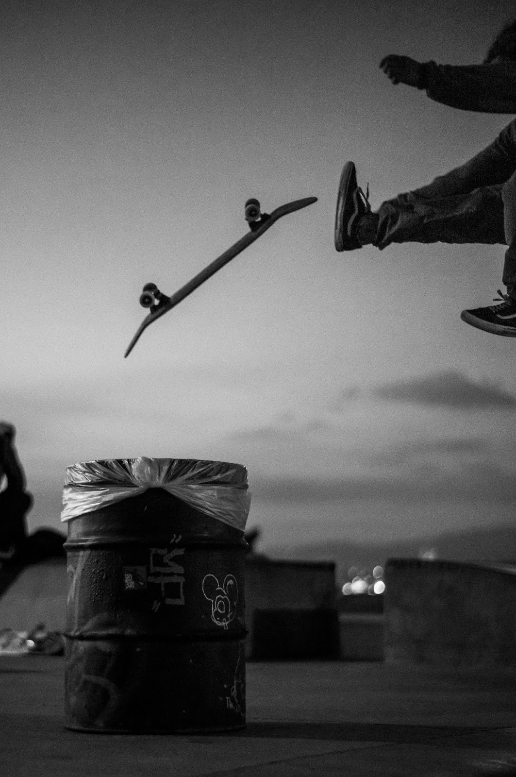 Photo of a skateboard suspended mid-air.