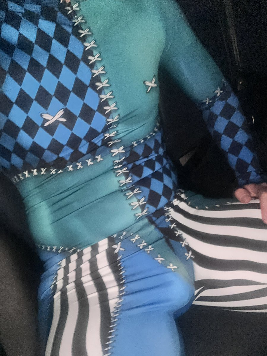 MrNiceCockSF taking a selfie in cross patterned body leotard showing off his gay bulge through the fabric