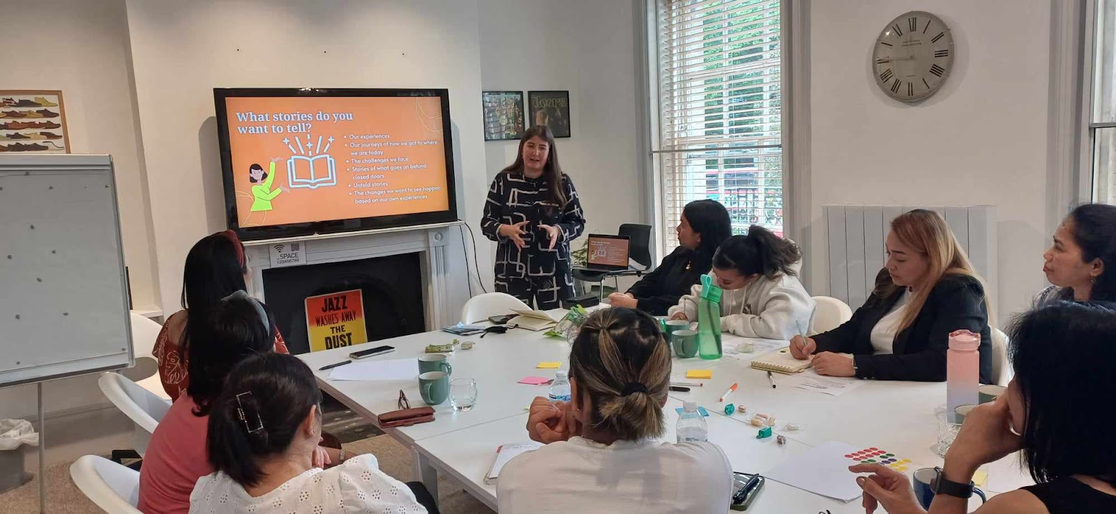 Participants learning about how to tell their stories from Sounddelivery Media trainer Suyin Hanes.
