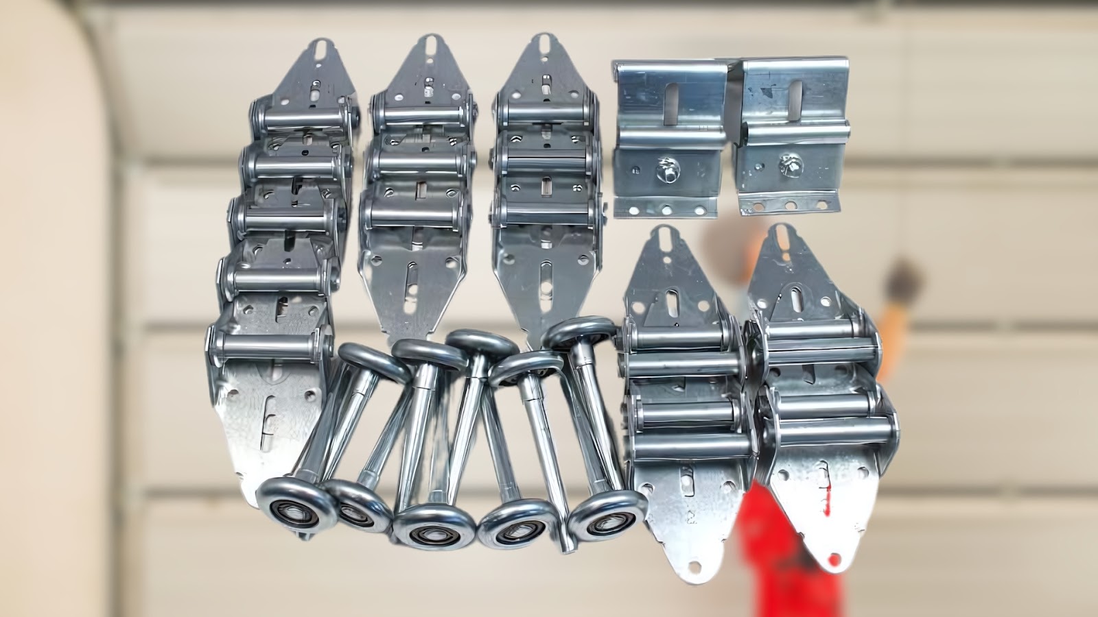 Garage door hinges and rollers as replacement parts