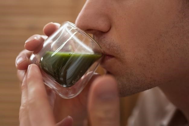 Side view man drinking matcha tea