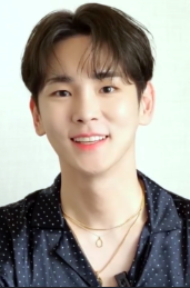 This contains an image of Key (SHINee)