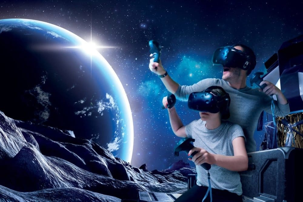 Student using VR headset to study plantes in classroom