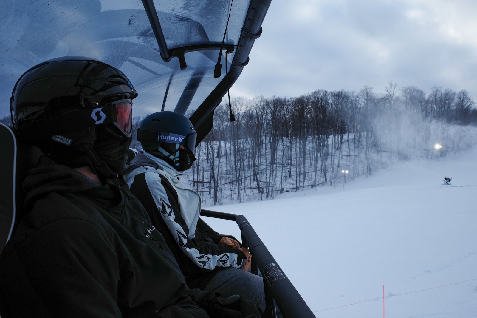 Skiiers on chairlift