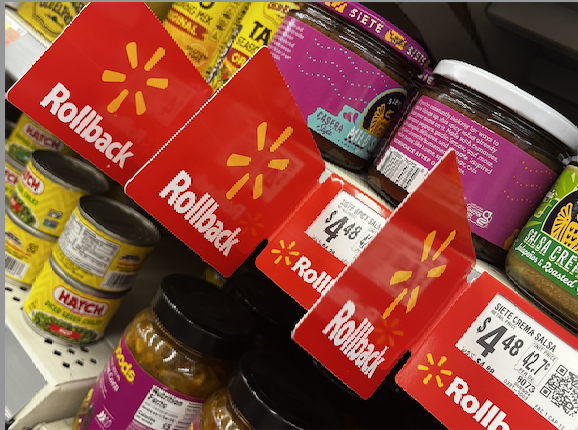 a rollback is when Walmart cuts the price of an item for a set period. They can lastup to six months. The rollback tag often sticks out of the shelf as seen below, and is usually tagged with a red and yellowish label showing both the current and previous price of the product. 