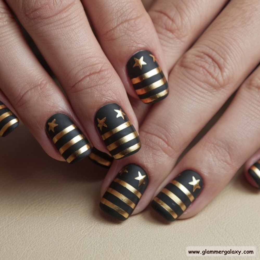 Black Fall Nails having Black & Gold Glamour
