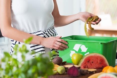 A person putting fruit into a recycling bin

AI-generated content may be incorrect.