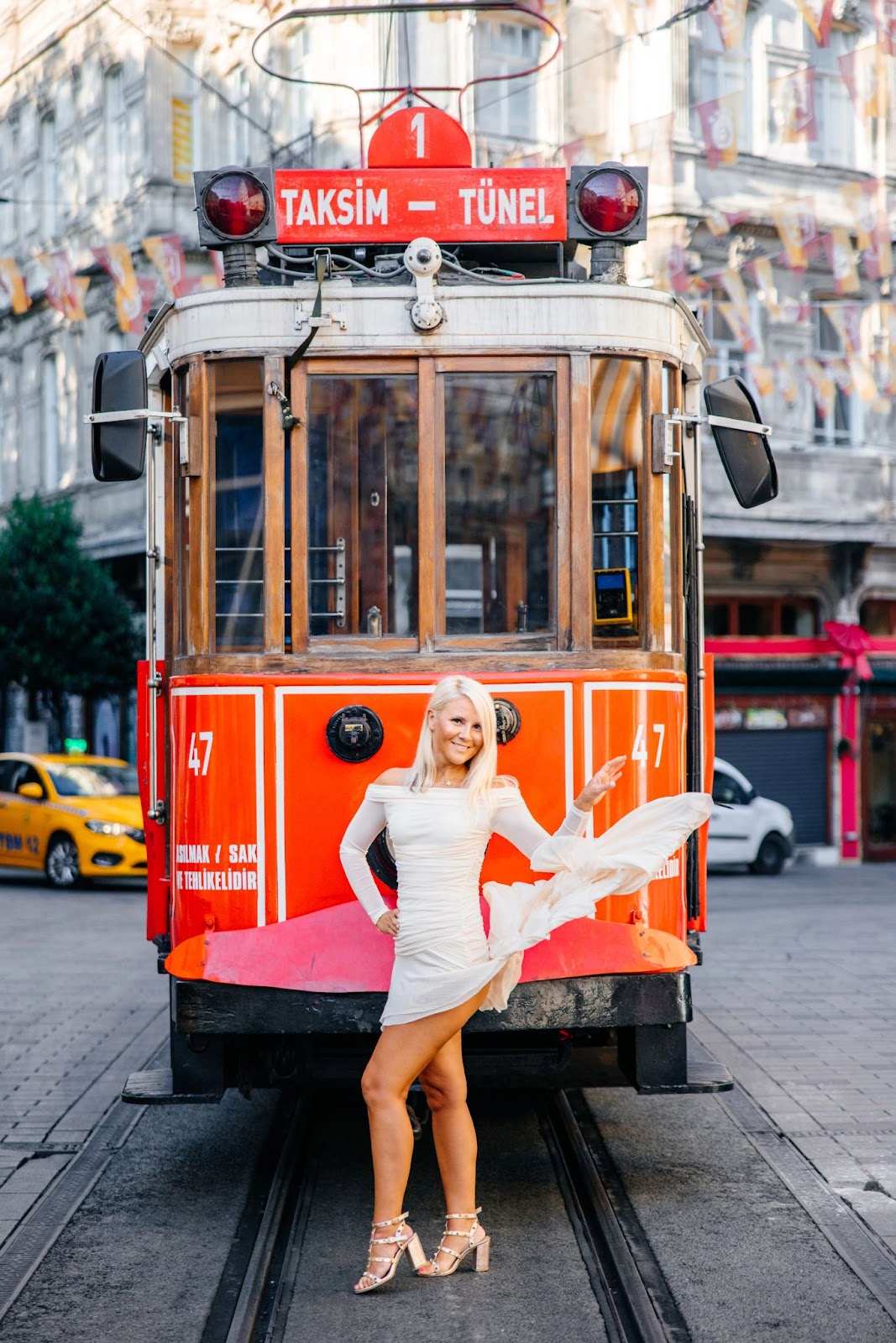 Solo wanderer flaunting in front of Taksim Tram