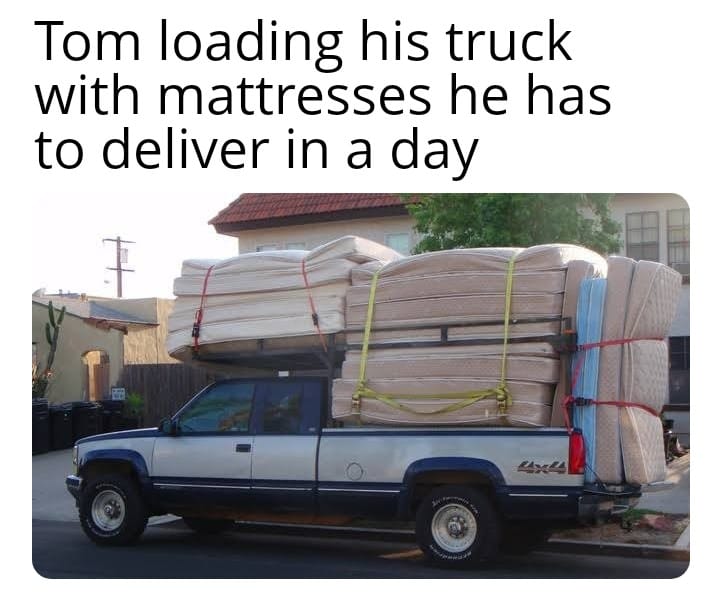 Sharetown Rep driving a truck with mattresses loaded that he will resale.