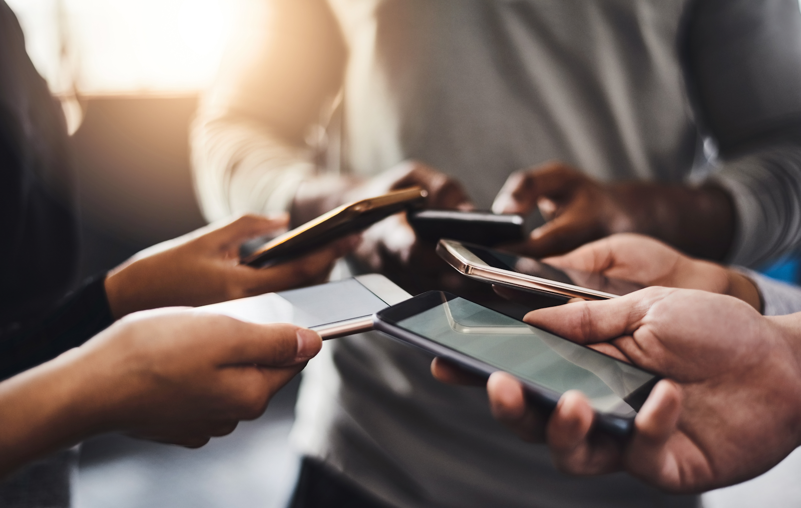 A group of people holding phones

AI-generated content may be incorrect.