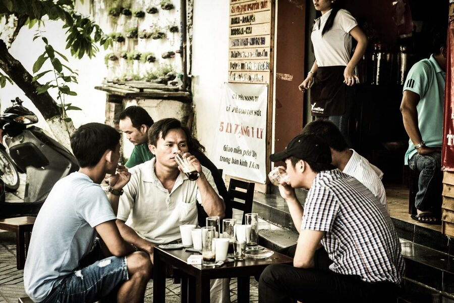 Locals in Hanoi frequently enjoy a cup of coffee in the crisp early morning air. Source: ohcowest