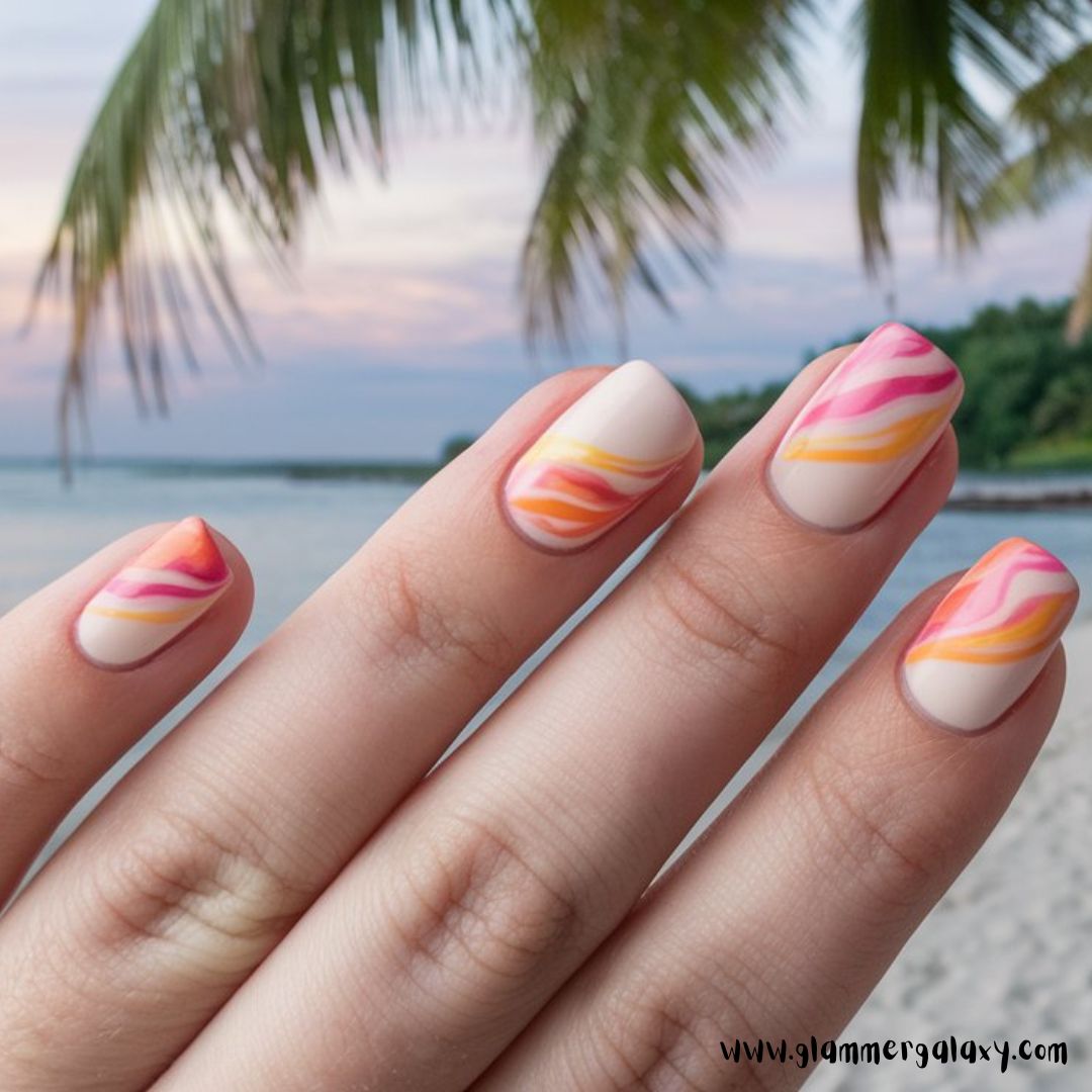 Classy Vacation Nails having Swirly Sunset Hues
