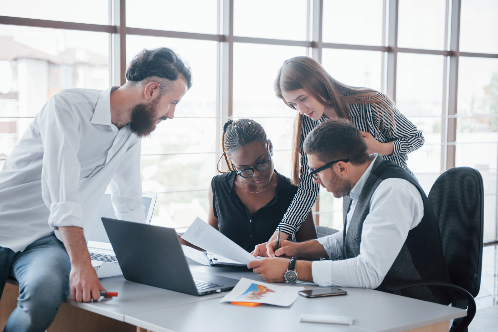 Employees discussing in an office