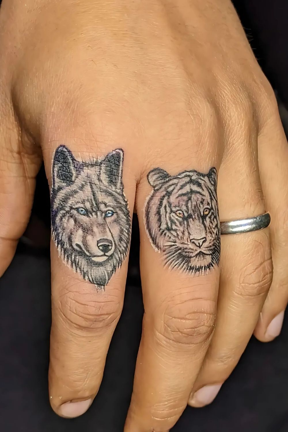 Wolf Finger Tattoo