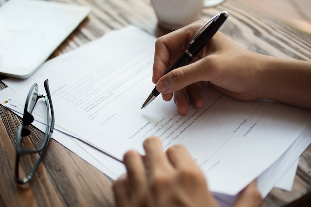 Person signing a contract