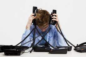 too many phones ringing, man is frustrated