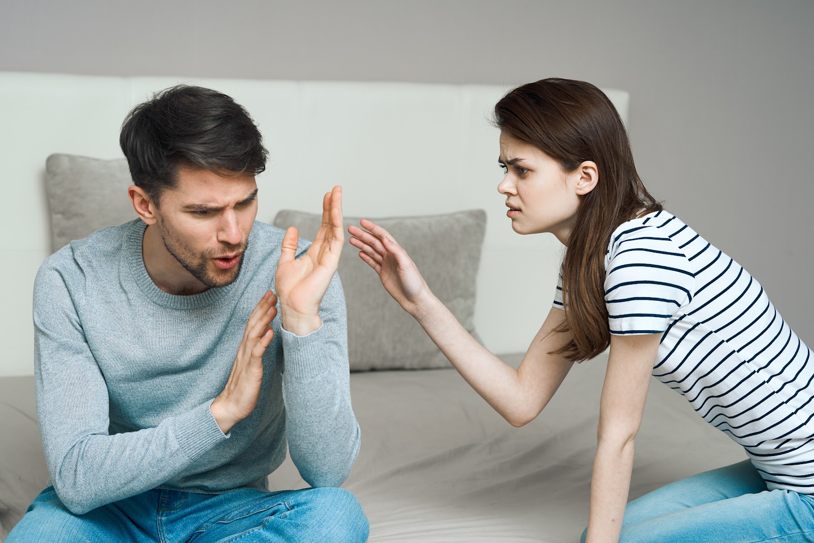 A man rejecting a woman's pleas | Source: Getty Images