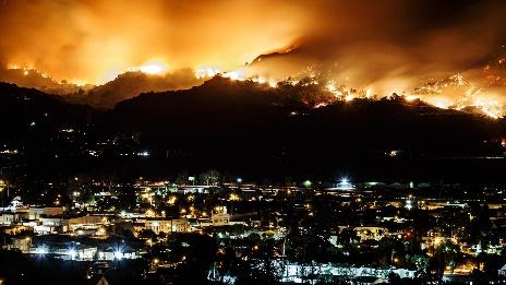 Smoke plume from the Maria Fire rises over Santa Paula Calif. on the night of Oct. 31 2019