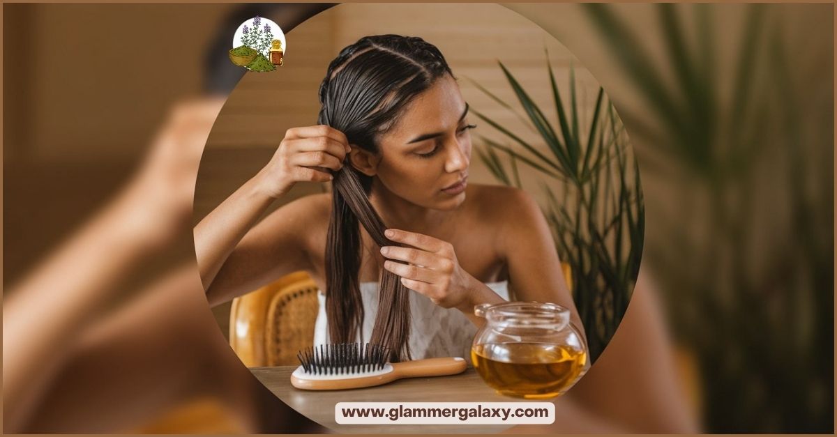 Person applying oil to hair, comb and oil jar on table