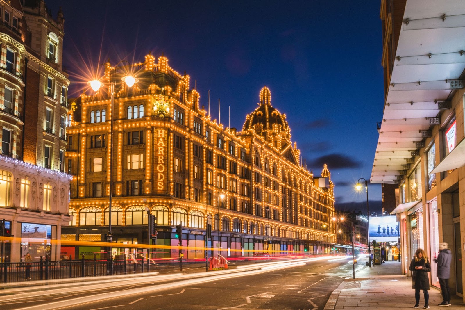 Luxurious Christmas window display at Harrods, featuring festive decorations and glittering lights in Knightsbridge, London