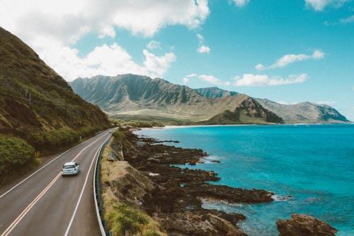 Free White Car on the Road Stock Photo