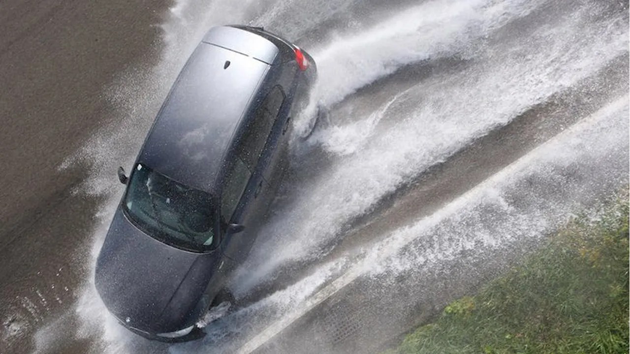 Loss of tire grip on wet roads caused by water buildup, leading to control loss; includes causes, prevention tips, and safe reactions. 