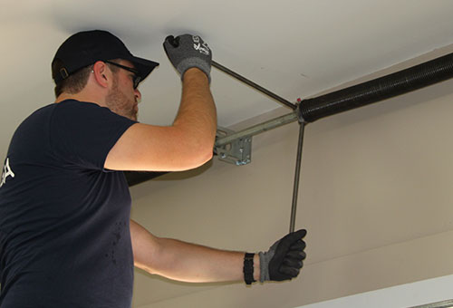 how to replace garage door spring