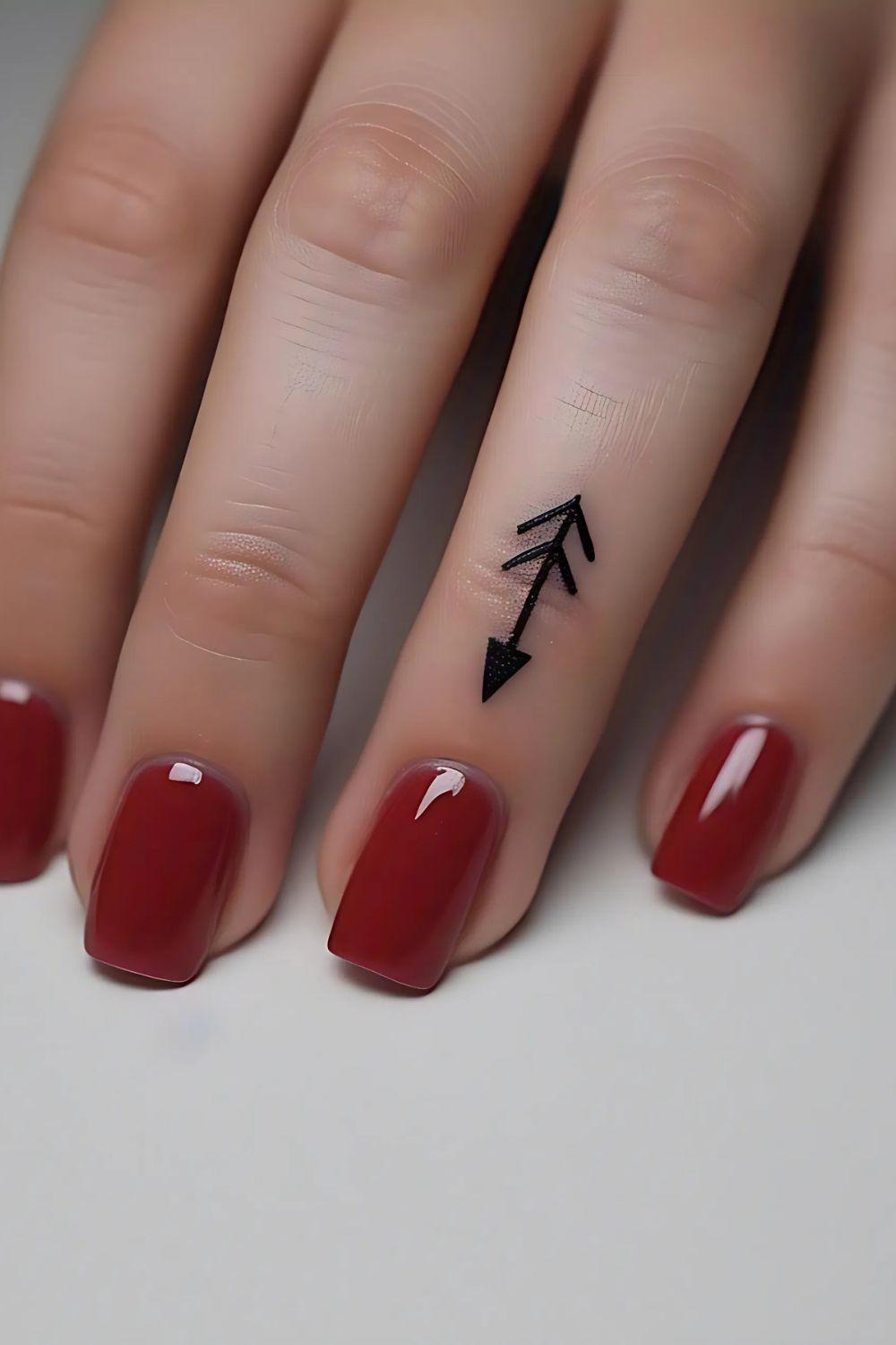 Arrow Finger Tattoo