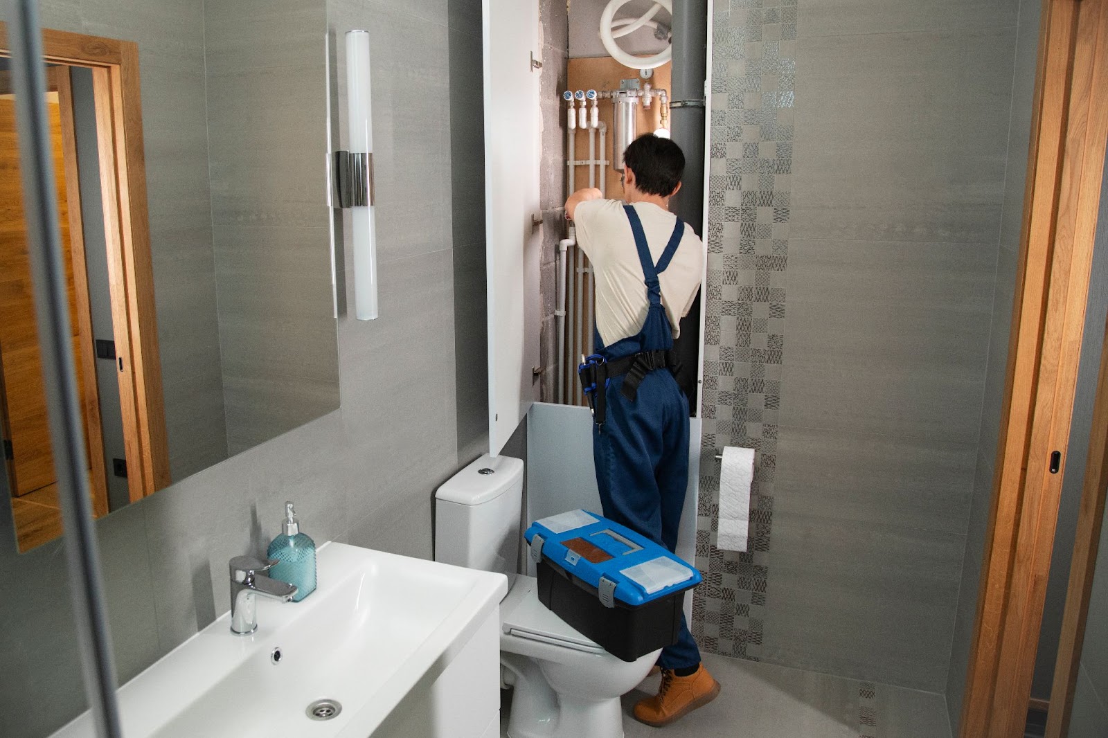 Person doing bathroom inspection-Preferred Construction