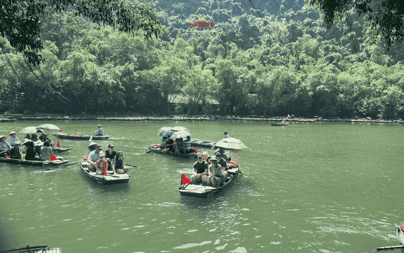 Travellers experience boat tours in Ninh Binh with Nadova Tours