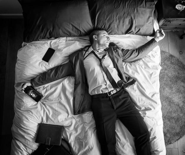 Drunk business man falling asleep as soon as he came back home