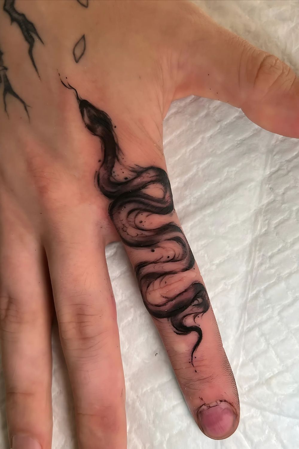 Snake Finger Tattoo